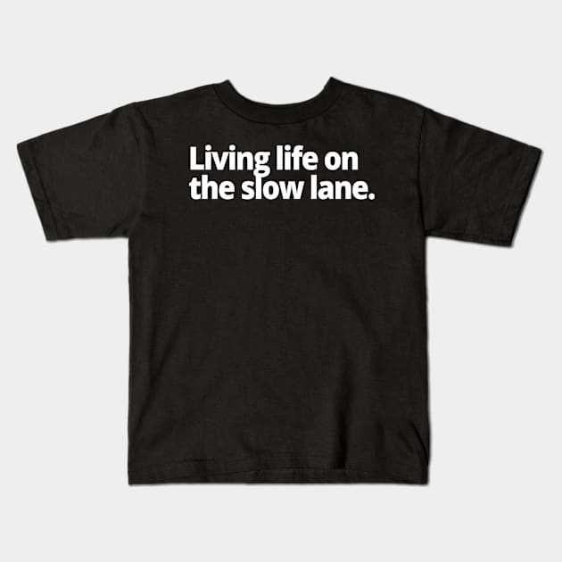 Living life on the slow lane. Kids T-Shirt by WittyChest